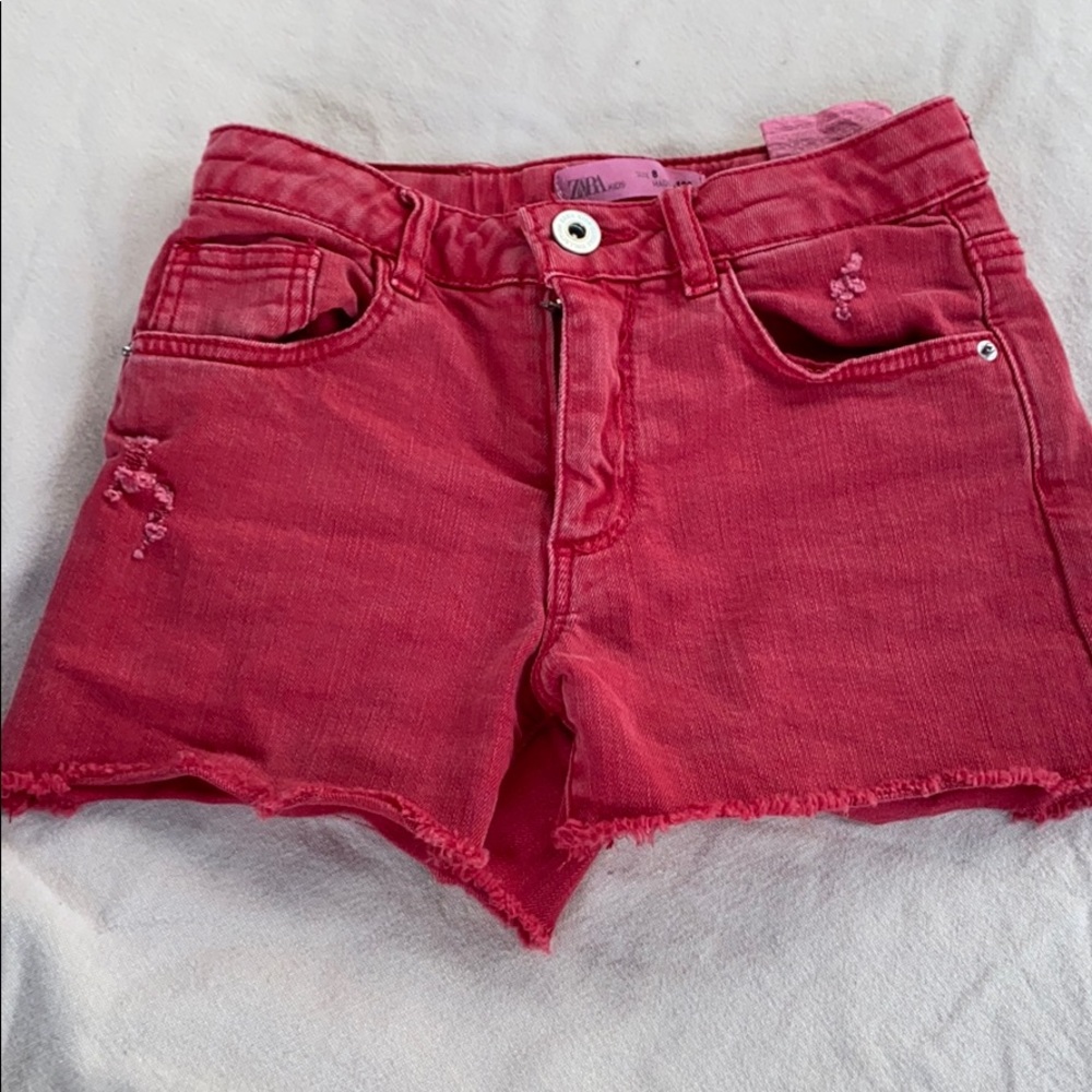 Girls red frayed denim shorts